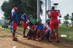 In Liberia’s version of baseball, there are no bats and no men